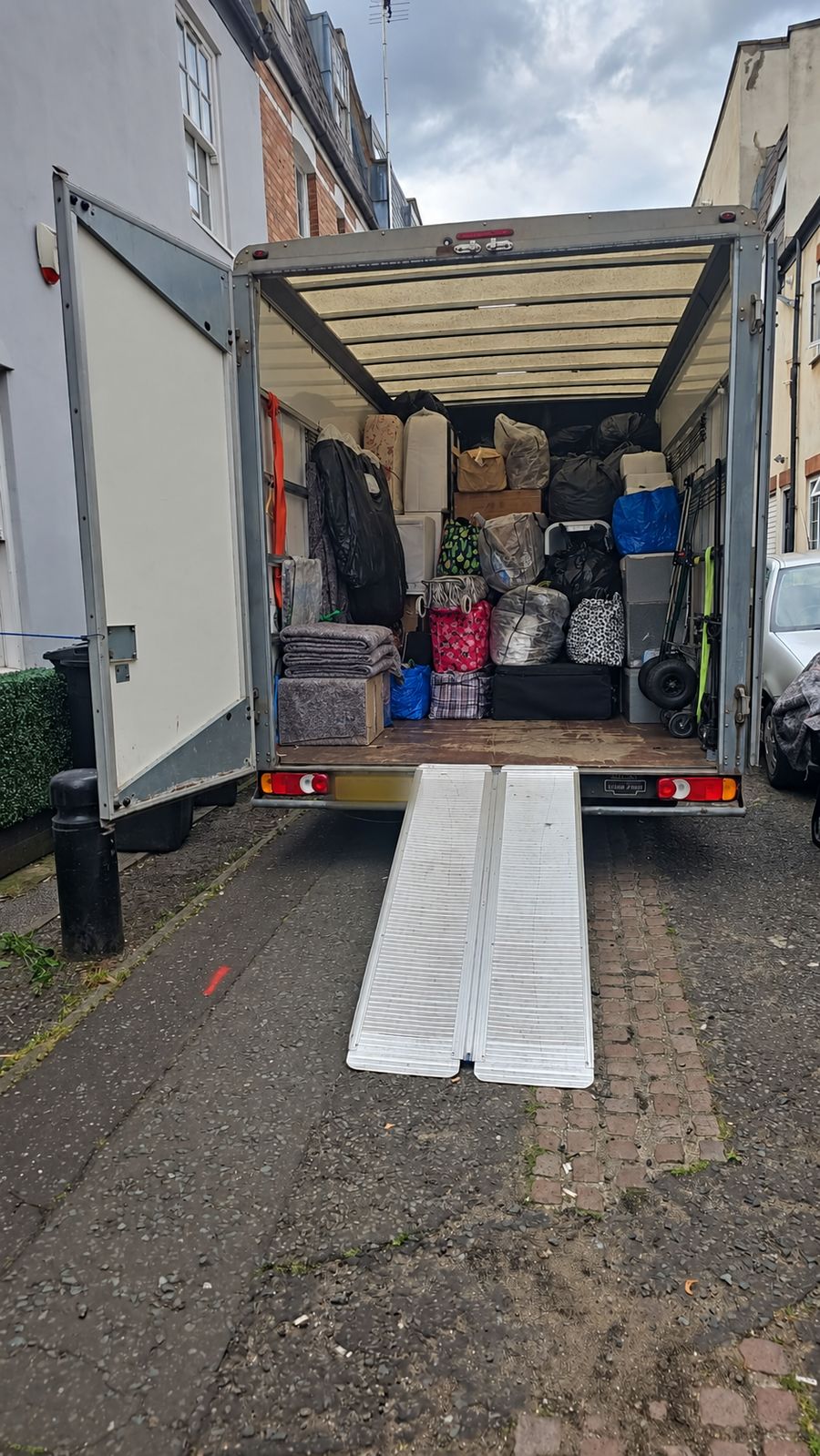 Removals van loaded and ready, ramp down on a London street